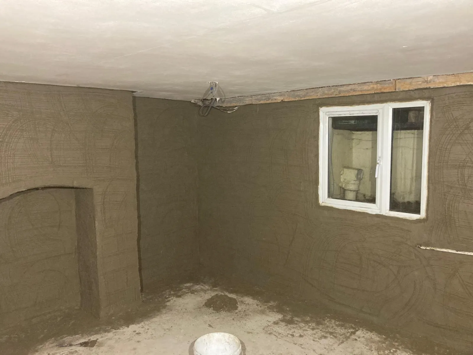 Damp-proof membrane and drainage channel installed along basement wall