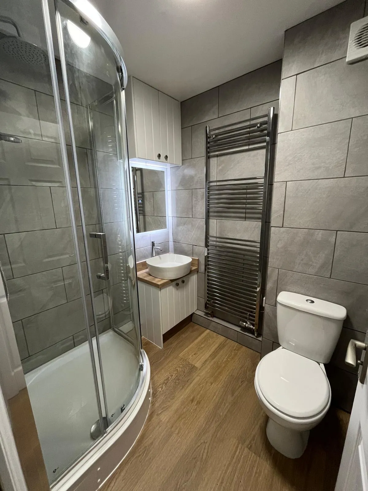 Full bathroom refit, with tiling and all fixtures replaced
