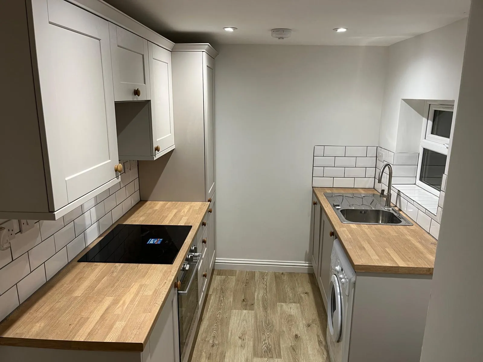 Newly fitted kitchen with units installed and room full decorated