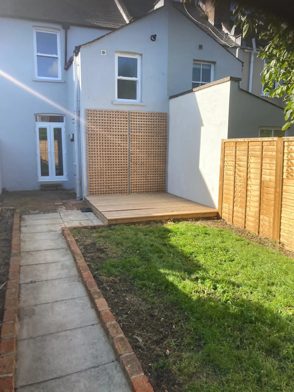 New timber decking, trellis screen and fencing in rear garden