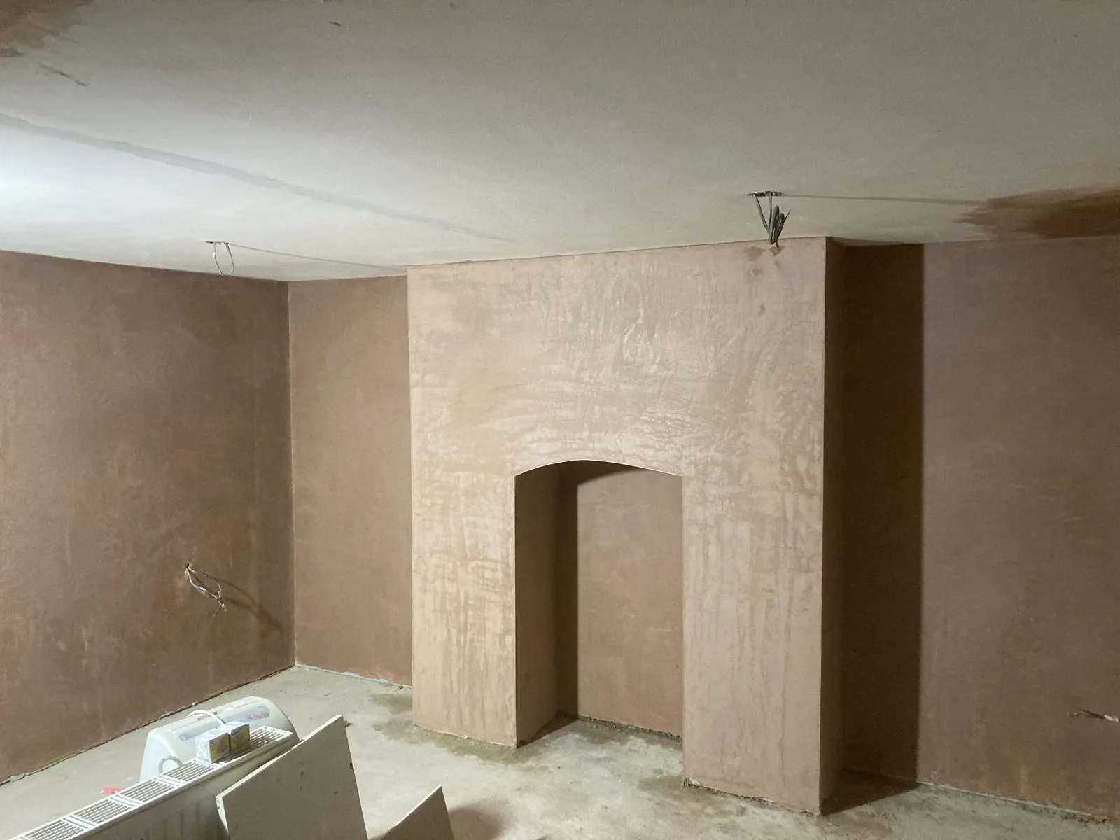 Basement drainage channel and membrane being installed around steels