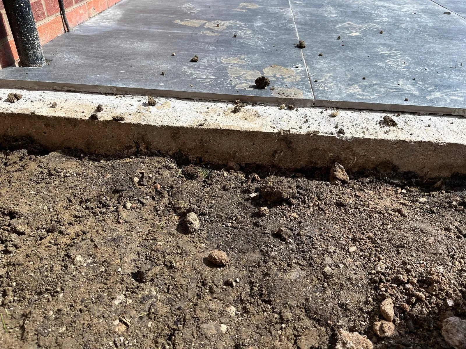 Freshly installed pad, levelled and prepared for further landscaping