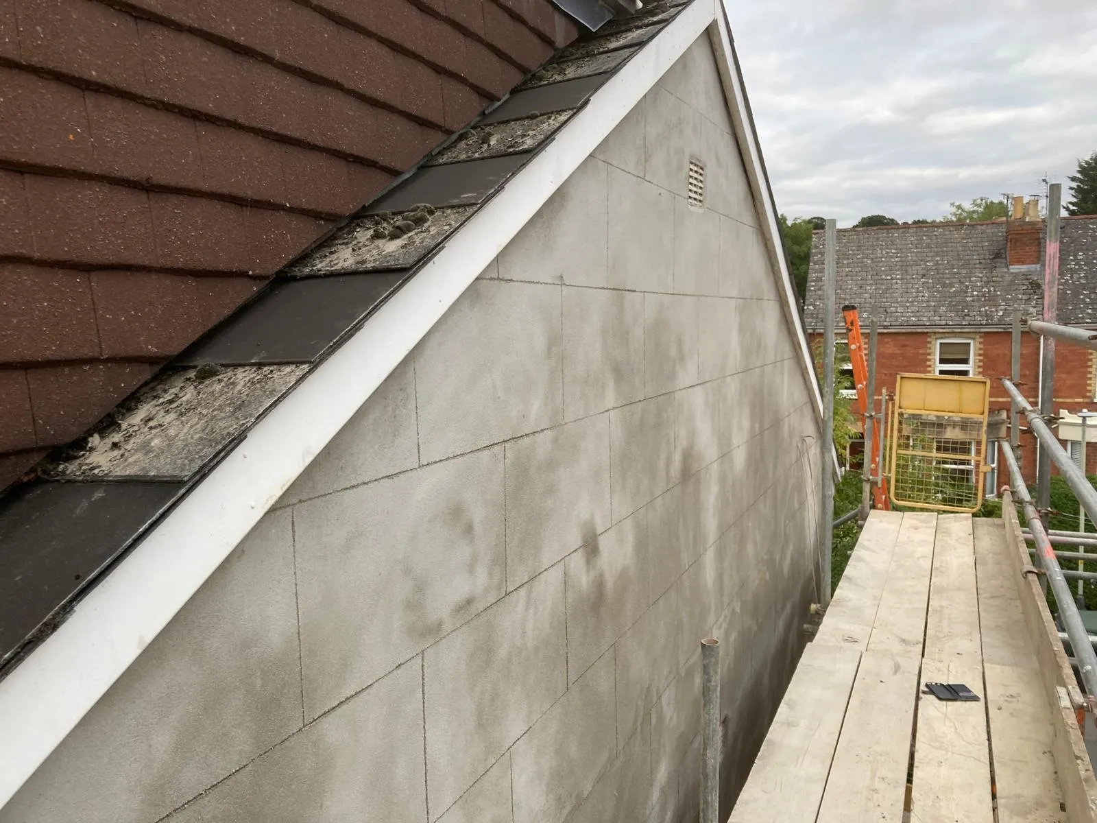Freshly rendered external brickwork, finished to a high standard