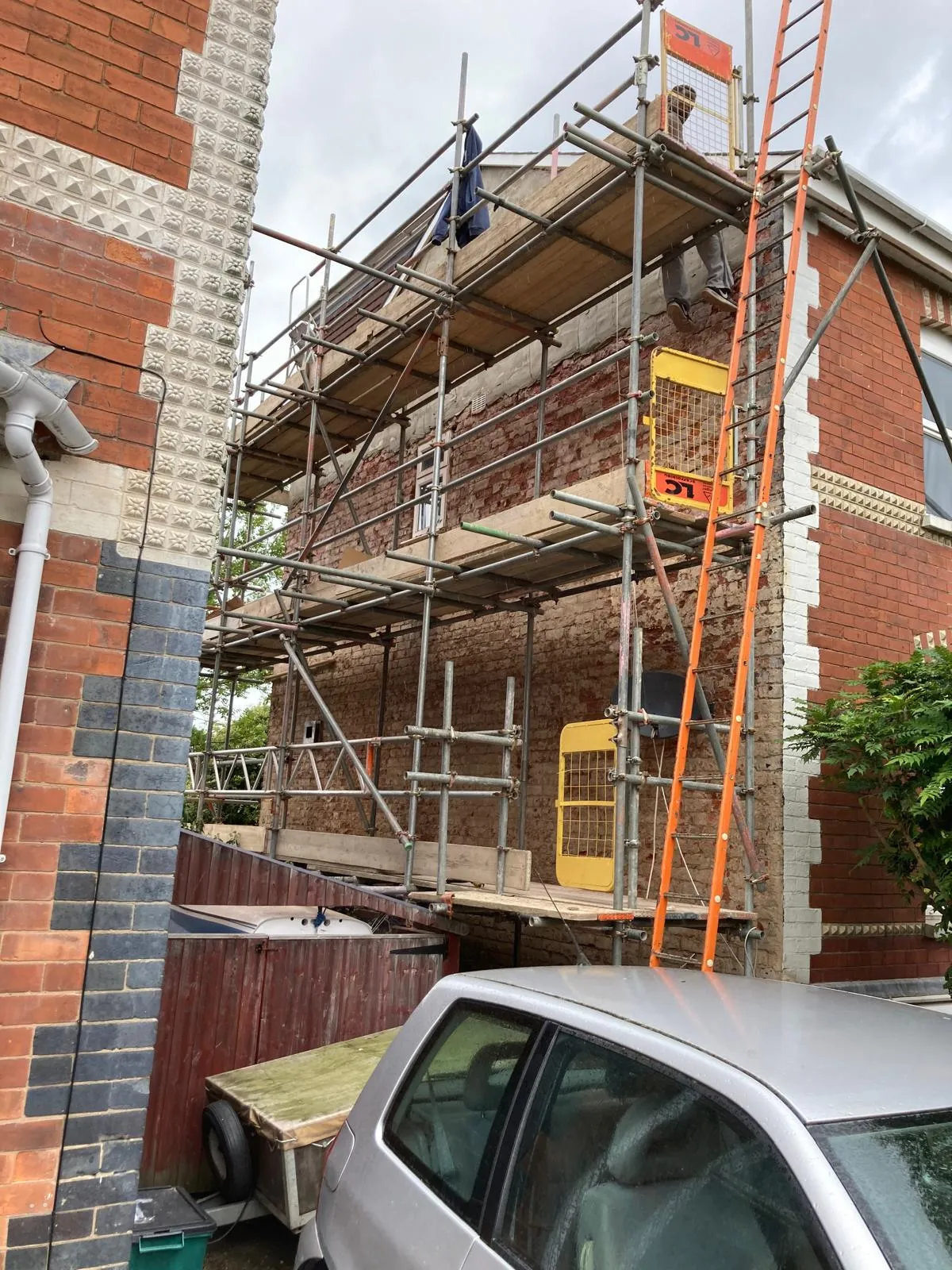 Old render taken back to the raw brickwork